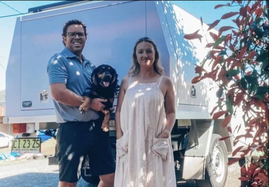 James, his wife and Robuck the termite detection dog outside the Ultra Pest ute